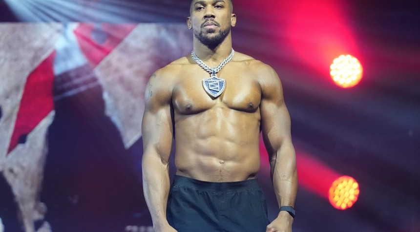 Anthony Joshua Returns to Britain After Fatal Nigeria Crash Claims Lives of Two Trainers