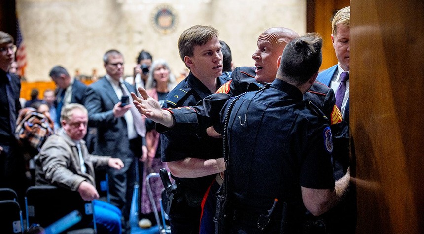 Marine Veteran Charged After Disrupting Senate Hearing on Iran Military Action