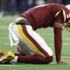 Jayden Daniels Carted Off Field After Elbow Injury Against Cowboys