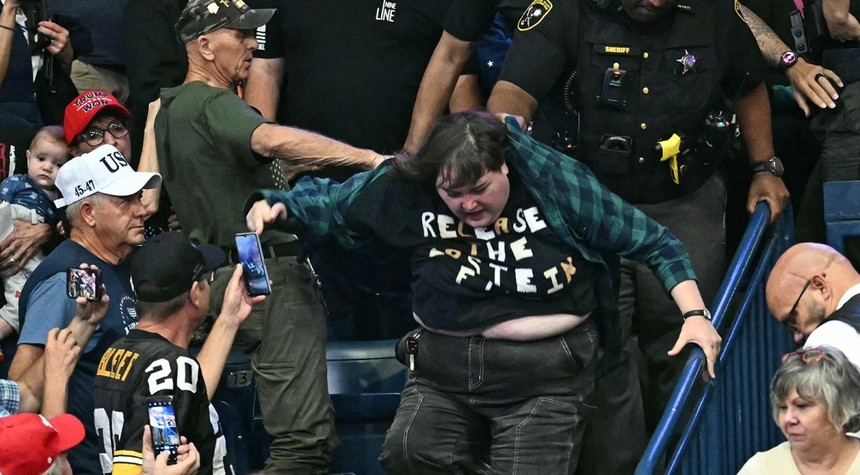 Violence Erupts at Trump Rally in Youngstown as Female Protester Is Attacked